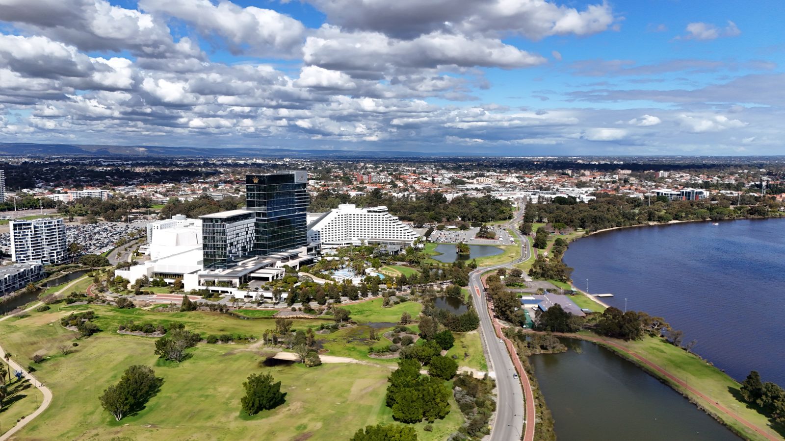 Aerial view capturing Burswood in WA, Australia featuring urban landscape and the scenic Swan River.